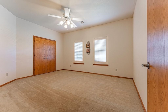 105 Kimberling Dr, Moore, OK 73160 - unfurnished room featuring light colored carpet and a ceiling fan