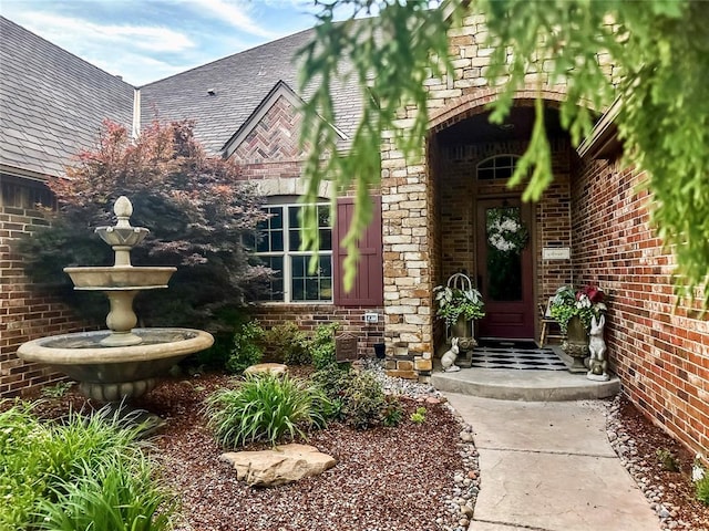 16721 Village Garden Dr, Edmond, OK 73012 - property entrance with brick siding