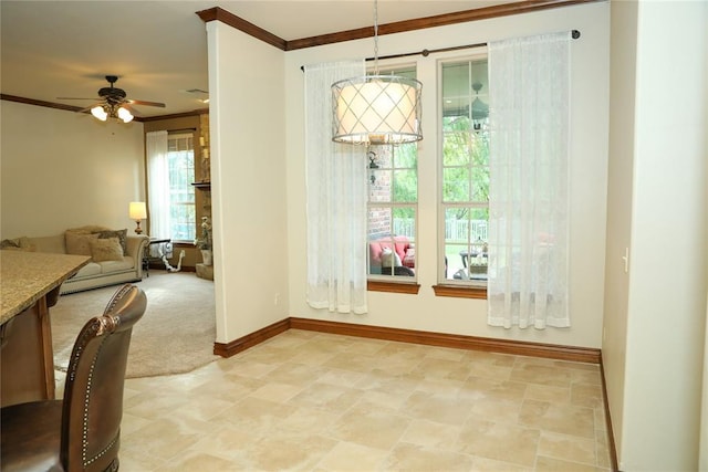 16721 Village Garden Dr, Edmond, OK 73012 - dining room featuring crown molding and ceiling fan