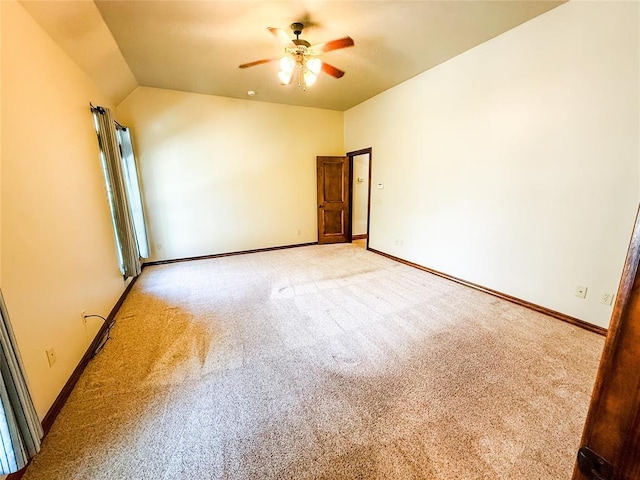 16721 Village Garden Dr, Edmond, OK 73012 - unfurnished room featuring light colored carpet, a ceiling fan, and vaulted ceiling