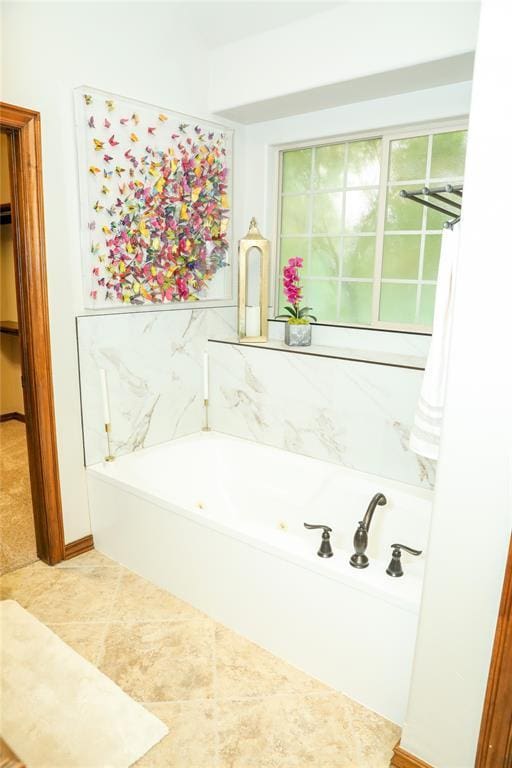 16721 Village Garden Dr, Edmond, OK 73012 - bathroom with a tub with jets