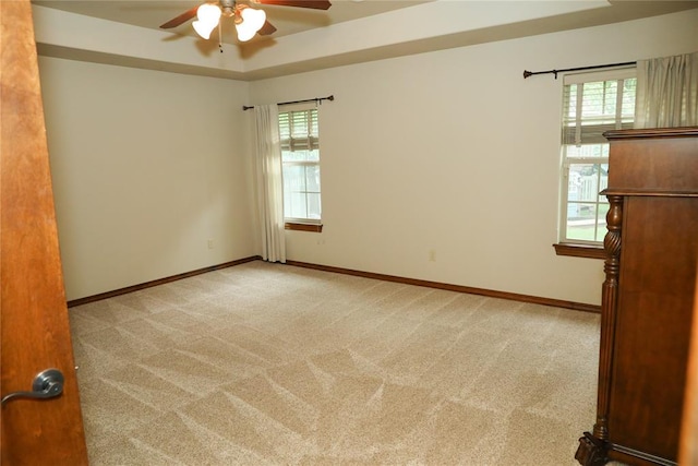 16721 Village Garden Dr, Edmond, OK 73012 - spare room featuring ceiling fan, plenty of natural light, and carpet floors
