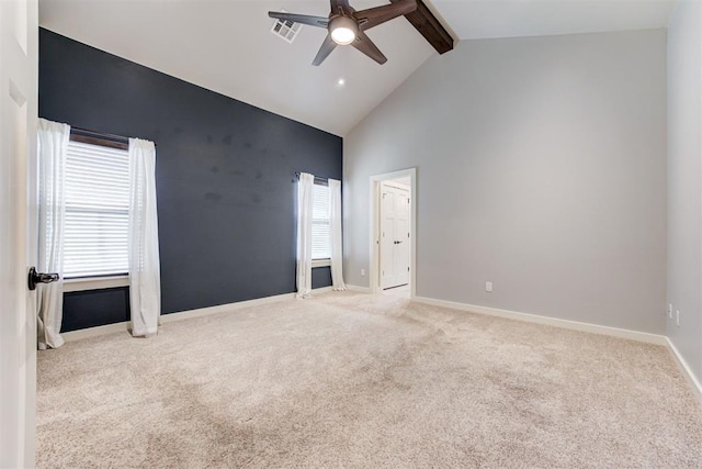 7600 Walk In The Park Dr, Edmond, OK 73034 - spare room featuring ceiling fan, carpet flooring, beamed ceiling, and high vaulted ceiling