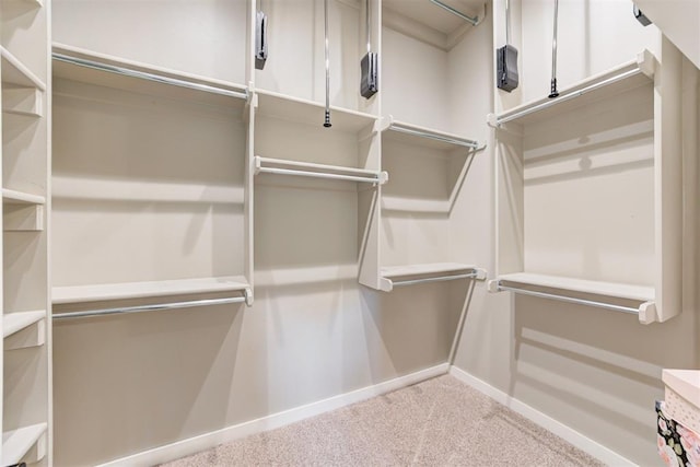 7600 Walk In The Park Dr, Edmond, OK 73034 - spacious closet with carpet flooring
