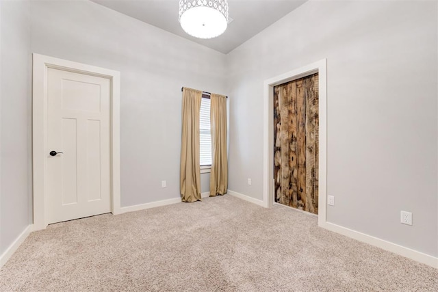 7600 Walk In The Park Dr, Edmond, OK 73034 - spare room featuring carpet flooring and baseboards