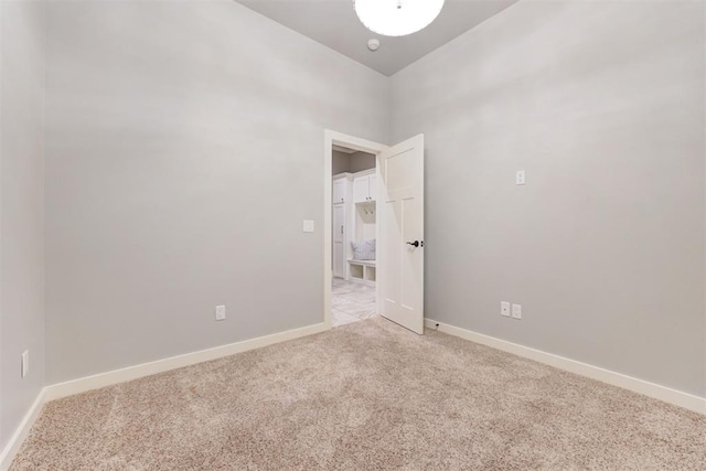 7600 Walk In The Park Dr, Edmond, OK 73034 - unfurnished room featuring light carpet and baseboards