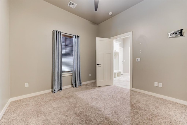 7600 Walk In The Park Dr, Edmond, OK 73034 - unfurnished room featuring ceiling fan and light colored carpet