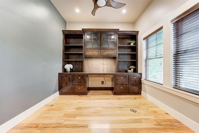 7600 Walk In The Park Dr, Edmond, OK 73034 - office area featuring a ceiling fan, light wood-type flooring, recessed lighting, and built in study area