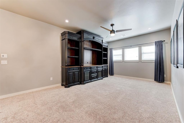7600 Walk In The Park Dr, Edmond, OK 73034 - unfurnished living room with a ceiling fan, light colored carpet, and recessed lighting