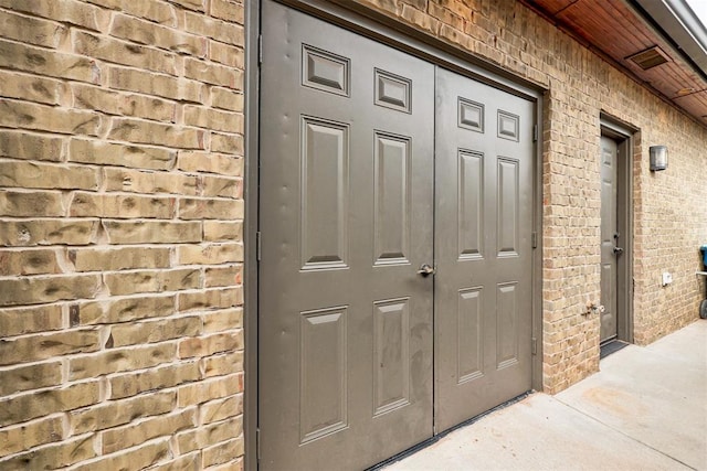 7600 Walk In The Park Dr, Edmond, OK 73034 - entrance to property featuring brick siding