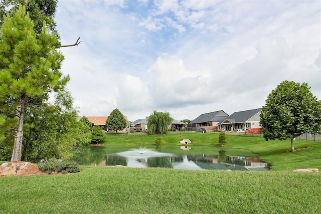 7600 Walk In The Park Dr, Edmond, OK 73034 - view of grassy yard featuring a water view