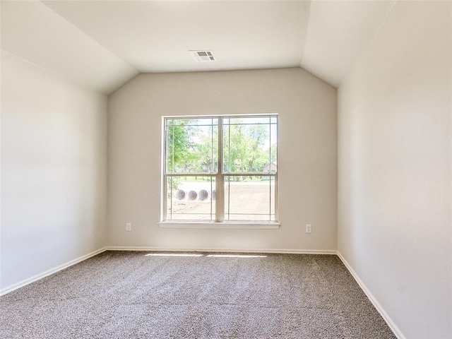 9070 Oak Tree Cir, Edmond, OK 73025 - empty room with carpet and vaulted ceiling