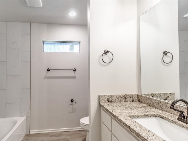 9070 Oak Tree Cir, Edmond, OK 73025 - bathroom featuring vanity, wood finished floors, recessed lighting, and shower / bathtub combination