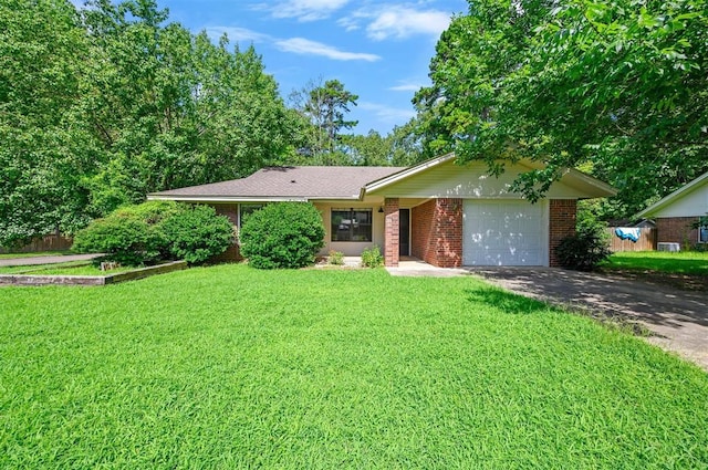 1001 Norris Ave, Broken Bow, OK 74728 - single story home with brick siding, asphalt driveway, an attached garage, and a front lawn
