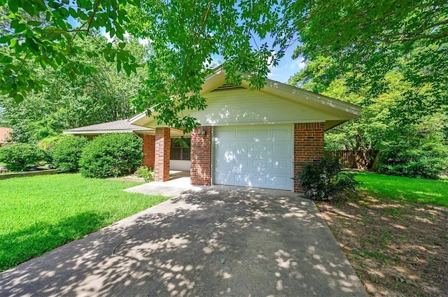 1001 Norris Ave, Broken Bow, OK 74728 - view of front of property with concrete driveway, brick siding, and an attached garage
