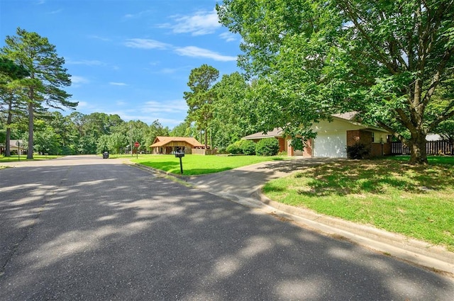 1001 Norris Ave, Broken Bow, OK 74728 - view of asphalt street with curbs