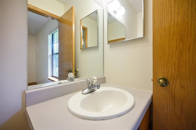 1001 Norris Ave, Broken Bow, OK 74728 - bathroom featuring vanity