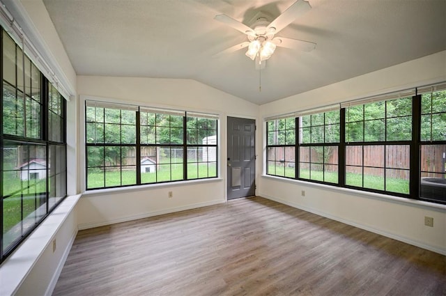1001 Norris Ave, Broken Bow, OK 74728 - unfurnished sunroom featuring vaulted ceiling
