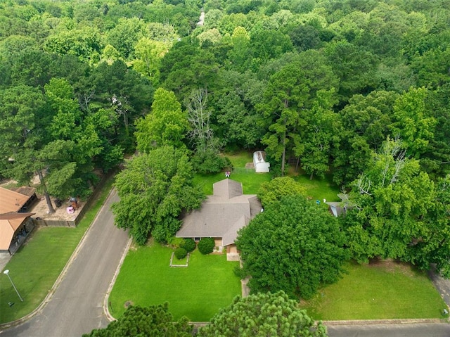 1001 Norris Ave, Broken Bow, OK 74728 - aerial view of property and surrounding area with a heavily wooded area