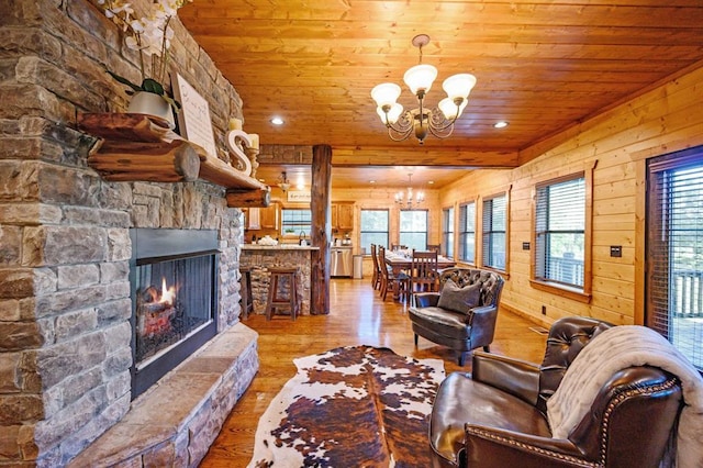 25 Paint Horse Cir, Broken Bow, OK 74728 - living area with a chandelier, wooden ceiling, light wood-style flooring, a fireplace, and recessed lighting