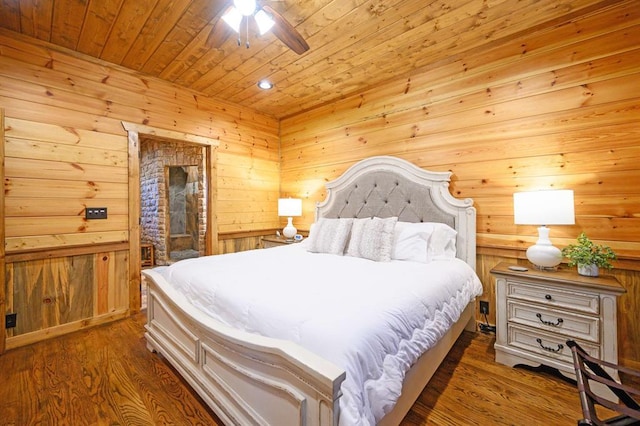 25 Paint Horse Cir, Broken Bow, OK 74728 - bedroom featuring wood ceiling, wooden walls, wood finished floors, a ceiling fan, and recessed lighting