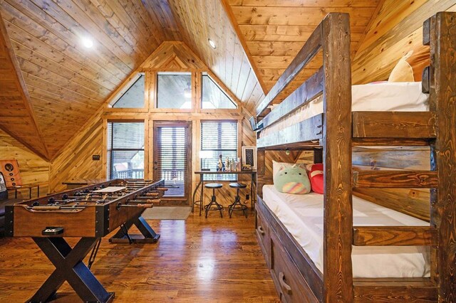 25 Paint Horse Cir, Broken Bow, OK 74728 - bedroom with vaulted ceiling, wooden walls, wooden ceiling, and wood finished floors