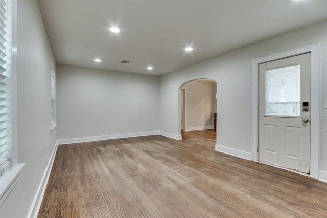 2524 NW 15th St, Oklahoma City, OK 73107 - entryway with arched walkways, wood finished floors, and recessed lighting