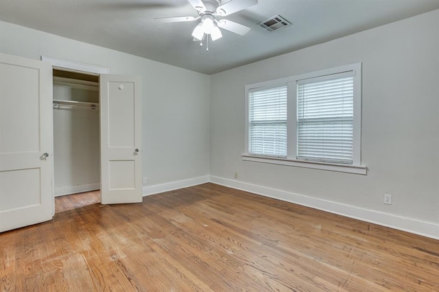 2524 NW 15th St, Oklahoma City, OK 73107 - unfurnished bedroom with light wood-type flooring, a ceiling fan, and a closet