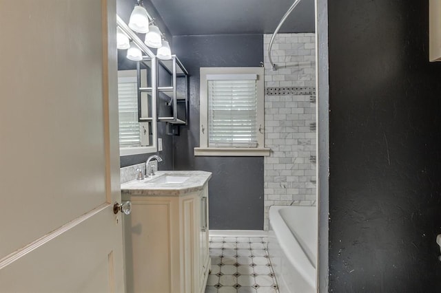2524 NW 15th St, Oklahoma City, OK 73107 - bathroom with vanity, tile patterned floors, and tub / shower combination