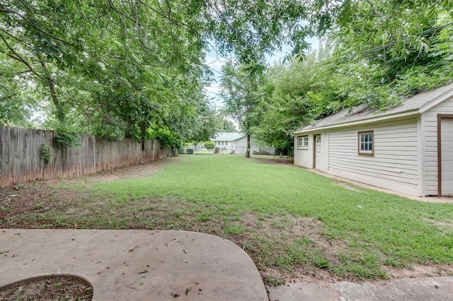 2524 NW 15th St, Oklahoma City, OK 73107 - fenced backyard with a patio area
