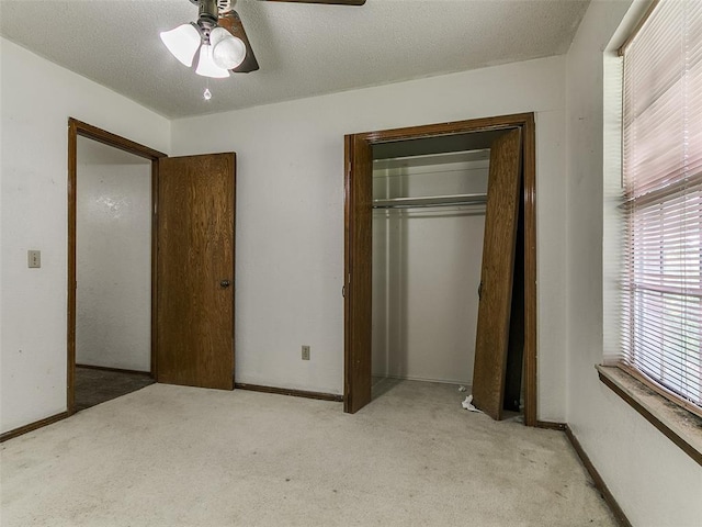 14601 Prairie Ln, Oklahoma City, OK 73165 - unfurnished bedroom with carpet, a closet, and ceiling fan