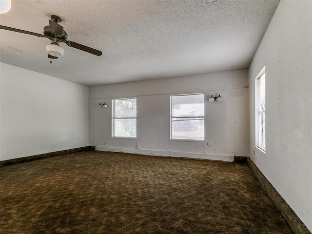 14601 Prairie Ln, Oklahoma City, OK 73165 - carpeted spare room featuring a textured ceiling and a ceiling fan