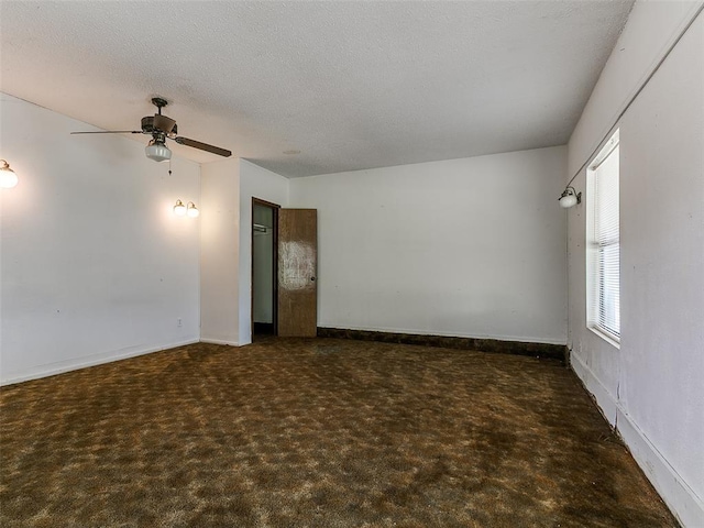14601 Prairie Ln, Oklahoma City, OK 73165 - spare room featuring a ceiling fan and a textured ceiling