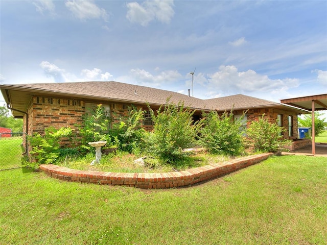 14601 Prairie Ln, Oklahoma City, OK 73165 - rear view of house featuring roof with shingles