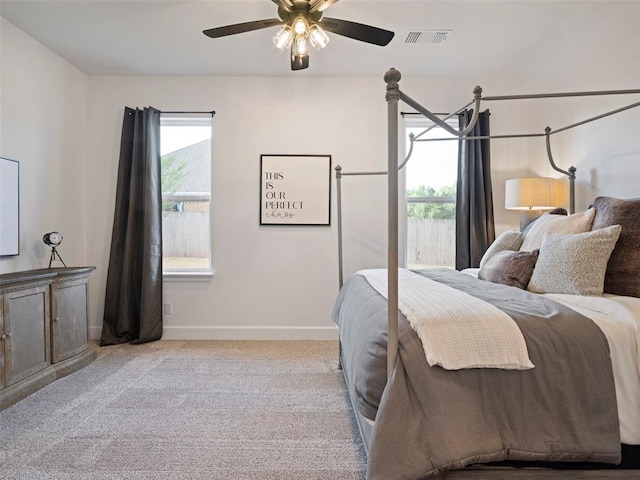 408 Nantucket Blvd, Norman, OK 73071 - carpeted bedroom with baseboards and a ceiling fan
