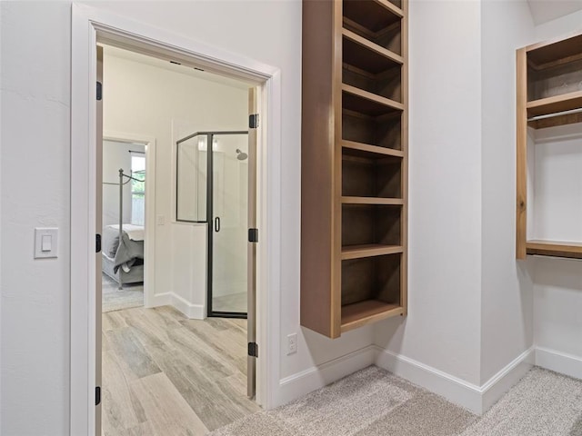 408 Nantucket Blvd, Norman, OK 73071 - spacious closet featuring wood finished floors