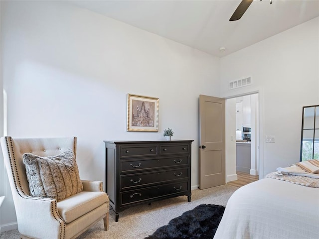 408 Nantucket Blvd, Norman, OK 73071 - bedroom featuring light carpet, a high ceiling, and a ceiling fan