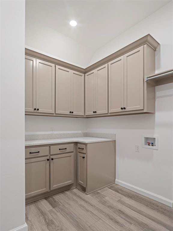 408 Nantucket Blvd, Norman, OK 73071 - washroom featuring cabinet space, washer hookup, light wood finished floors, and recessed lighting