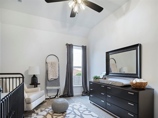 408 Nantucket Blvd, Norman, OK 73071 - bedroom with light colored carpet, lofted ceiling, and ceiling fan