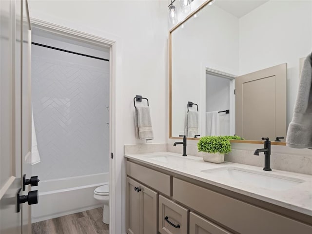 408 Nantucket Blvd, Norman, OK 73071 - full bath featuring double vanity, wood finished floors, and  shower combination