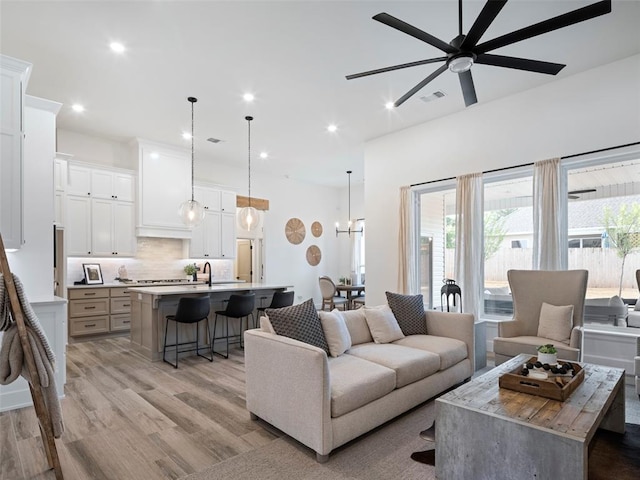 408 Nantucket Blvd, Norman, OK 73071 - living area featuring a ceiling fan, light wood finished floors, and recessed lighting