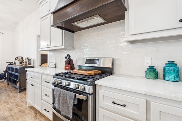 10413 SW 51st St, Mustang, OK 73064 - kitchen with gas stove, custom range hood, light countertops, and backsplash