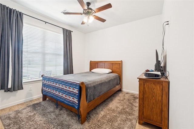 10413 SW 51st St, Mustang, OK 73064 - bedroom featuring light wood-type flooring and ceiling fan