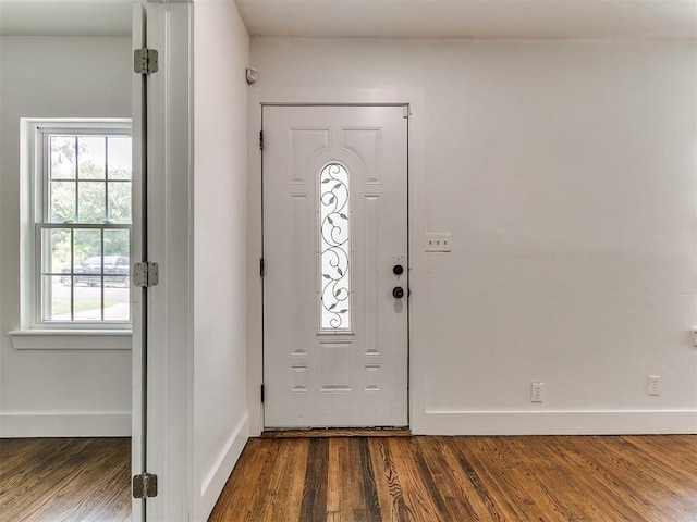 2016 Hardin Dr, Oklahoma City, OK 73111 - entryway with baseboards and dark wood-style flooring