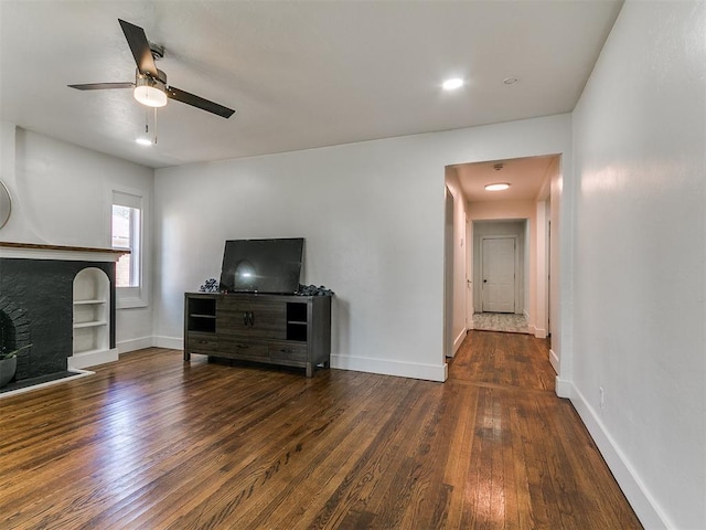 2016 Hardin Dr, Oklahoma City, OK 73111 - living room with hardwood / wood-style flooring, ceiling fan, and a fireplace