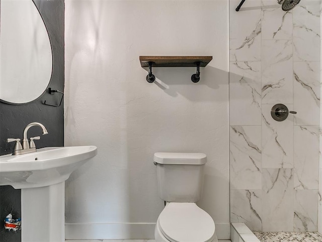 2016 Hardin Dr, Oklahoma City, OK 73111 - bathroom with a marble finish shower and toilet