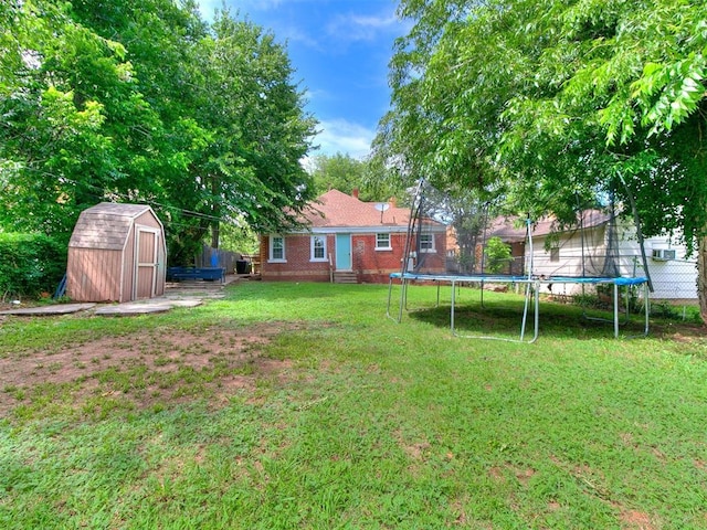 2016 Hardin Dr, Oklahoma City, OK 73111 - view of yard with a trampoline and a storage unit