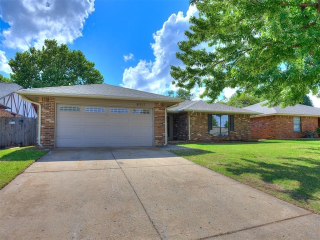 8317 Curtis Ter, Oklahoma City, OK 73132 - ranch-style house featuring driveway, brick siding, and a garage