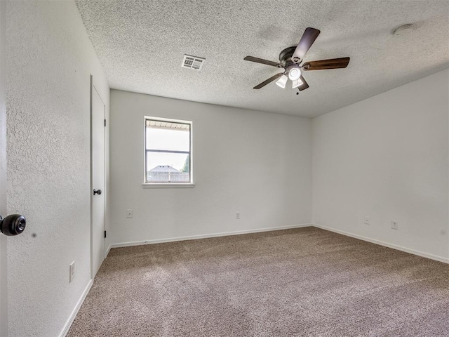 8317 Curtis Ter, Oklahoma City, OK 73132 - carpeted empty room featuring a ceiling fan and a textured ceiling