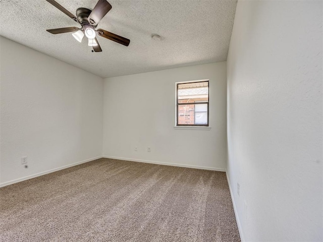 8317 Curtis Ter, Oklahoma City, OK 73132 - spare room with a textured ceiling, carpet, and ceiling fan